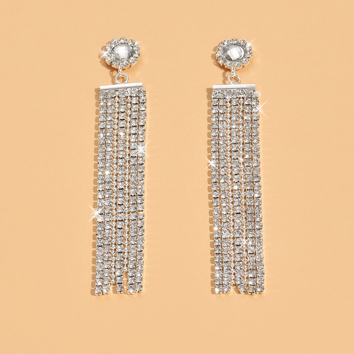 Boucles d'oreilles en strass argenté style