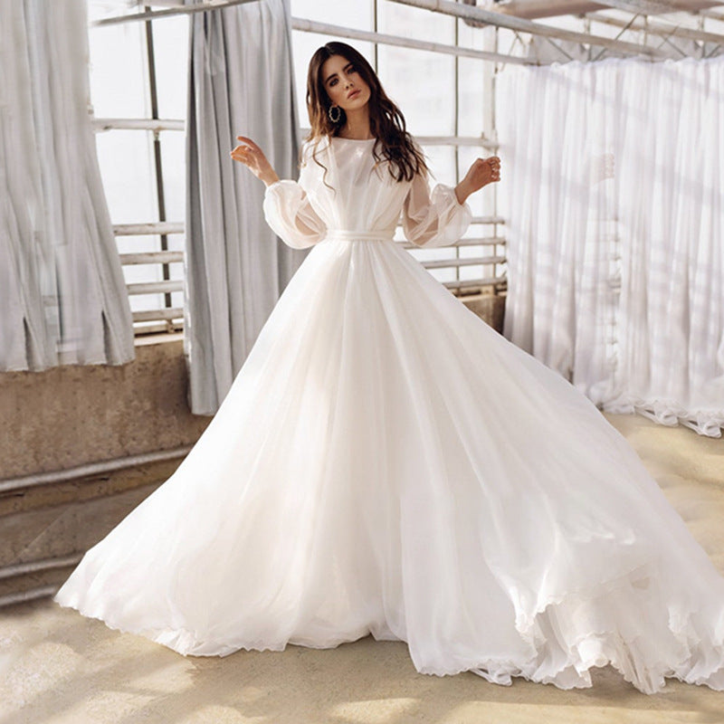 Robe de mariée à manches longues de style français avec une taille ajustée