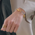 Bracelet en acier inoxydable à noeuds enroulés