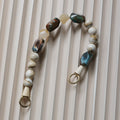 Sac à main en résine d'abricot avec une chaîne d'épaule