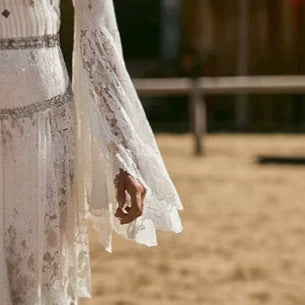 Robe longue en dentelle blanche de style occidental
