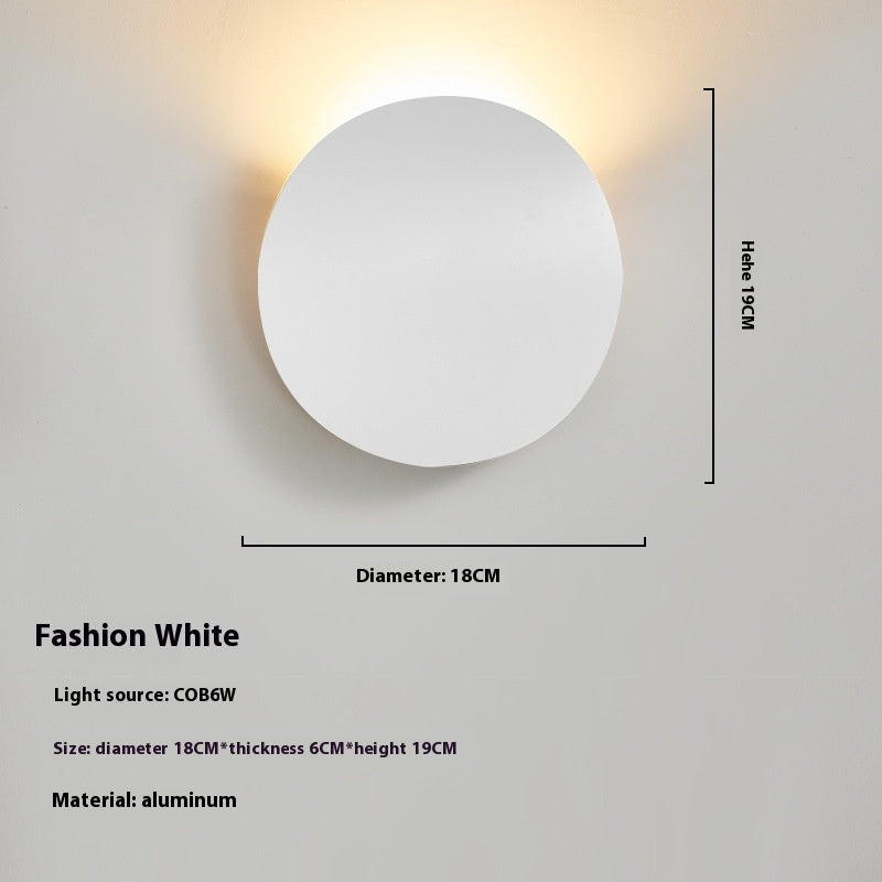 Lampe murale simple côté lit