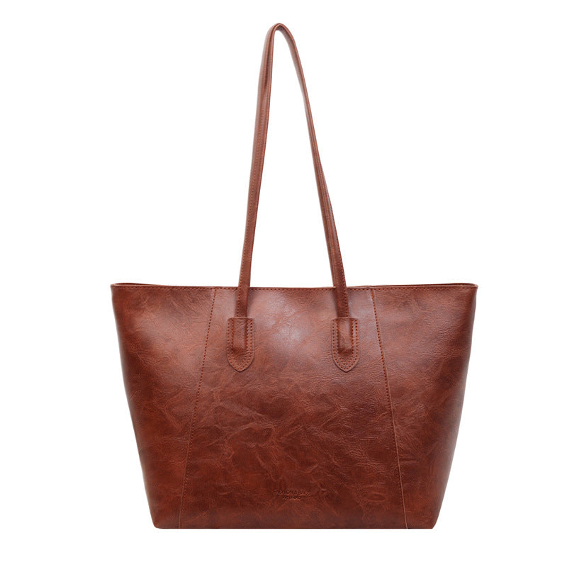 Versatile Commuter Sac à bandoulière cette année Tendance est le tote spacieux