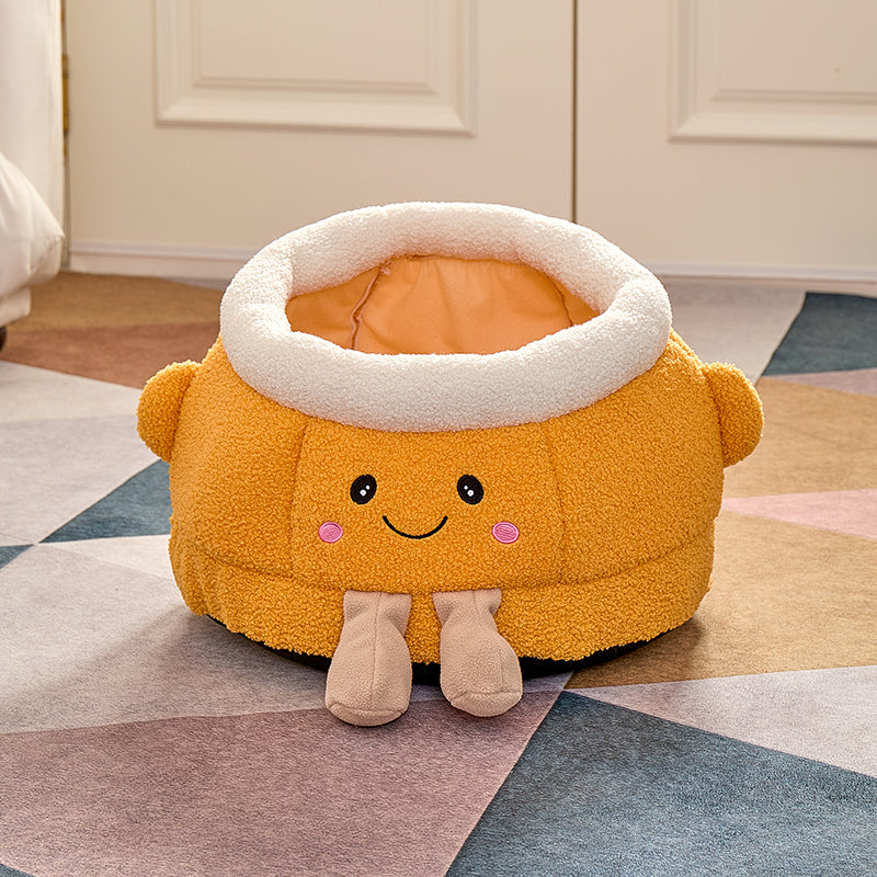 Lit de chat avec sourire orange