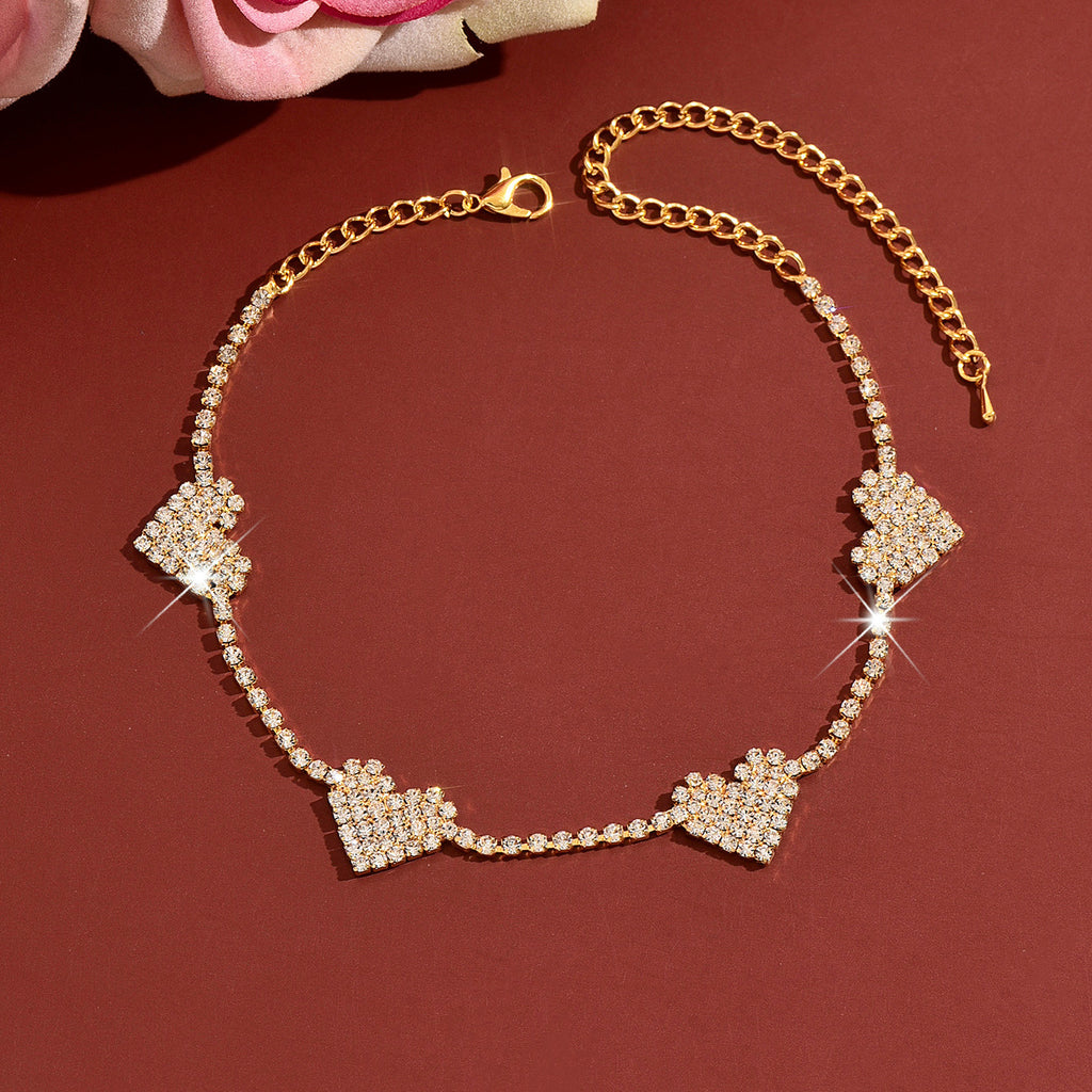 Femmes Quatre coeurs Pavés CZ Collier Choker