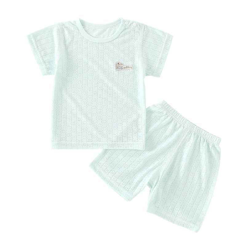 Le top et le short pour enfants deux-pièces d'été