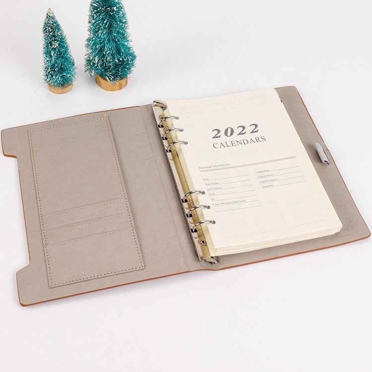 Pages intérieures de carnets à feuillets mobiles avec plan mensuel