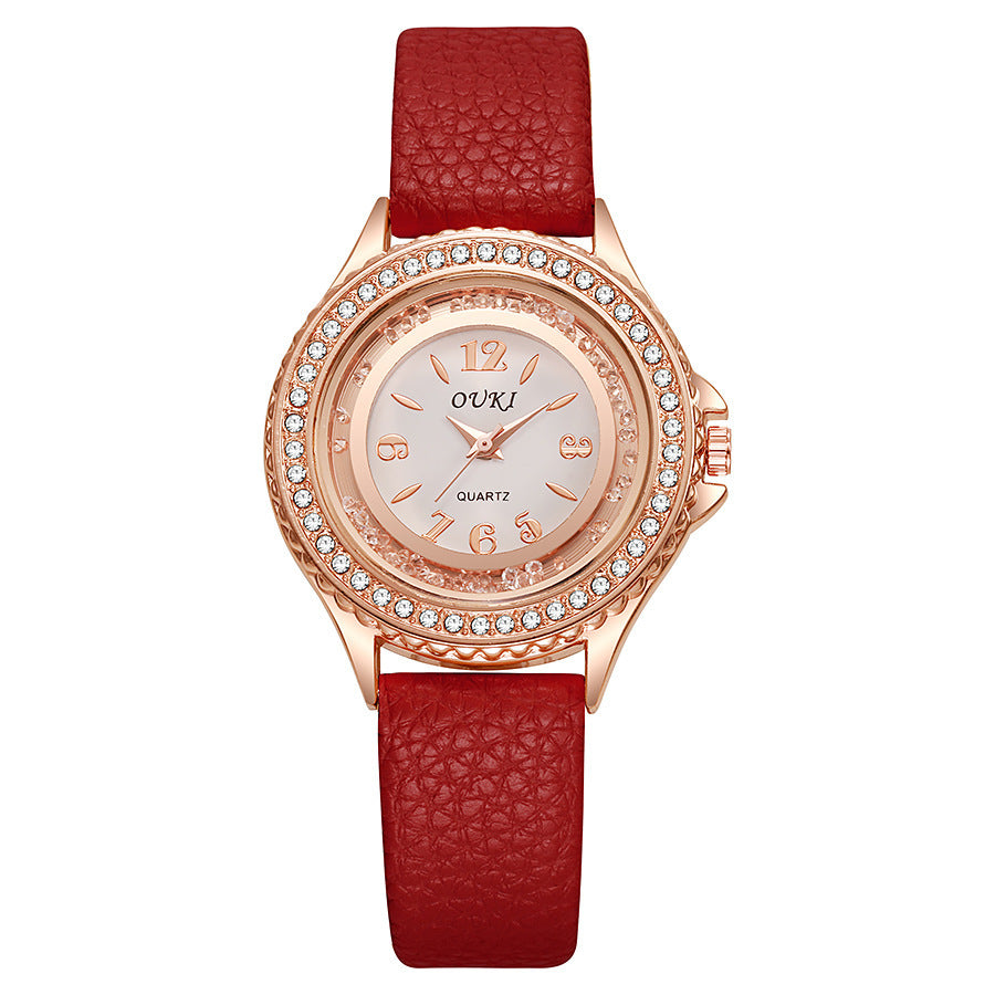 Élégante et minimaliste montre féminine ronde en strass
