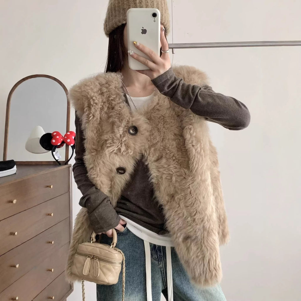 Veste en cuir et en fourrure mi-longueur
