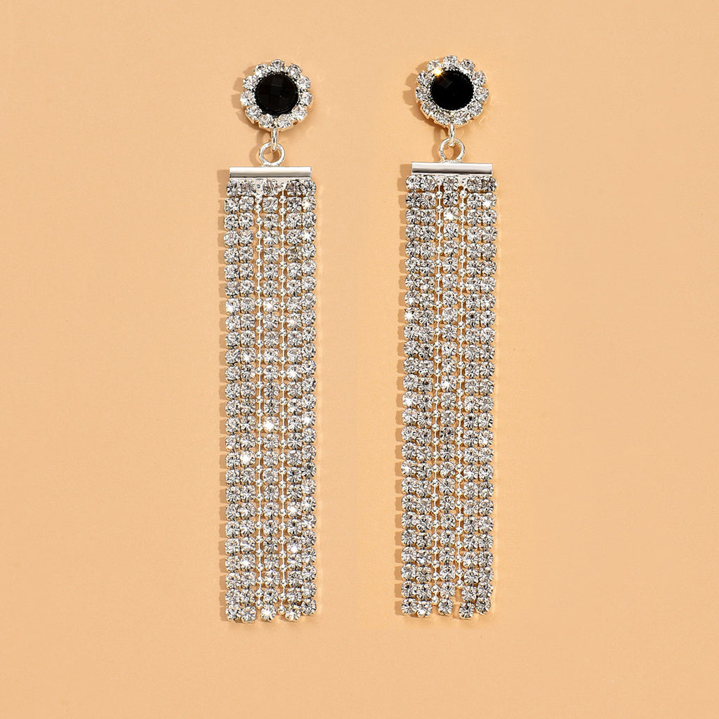 Boucles d'oreilles en strass argenté style