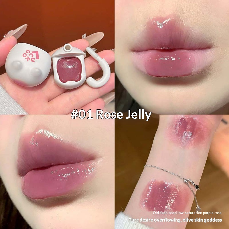 Orange Cat Lip Glaze Sheer et jeune avec une finition miroir comme Dewy