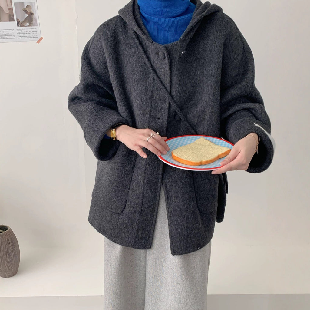 Manteau en laine à capuche alpaga