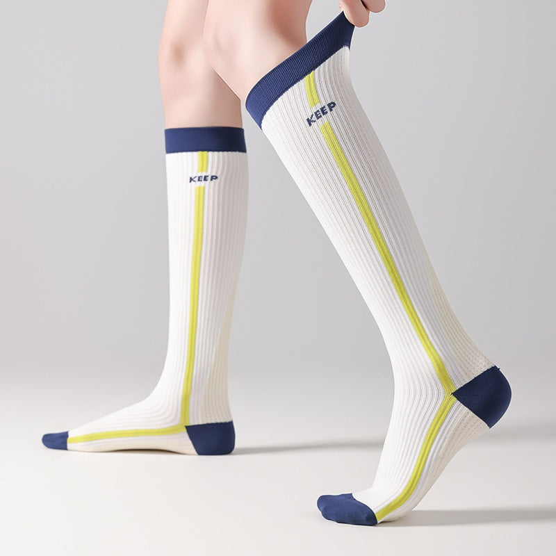 Chaussettes de calf à compression progressive pour femmes avec bandes de blocs de couleur