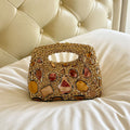 Sac à main de soirée doré robuste avec diamants