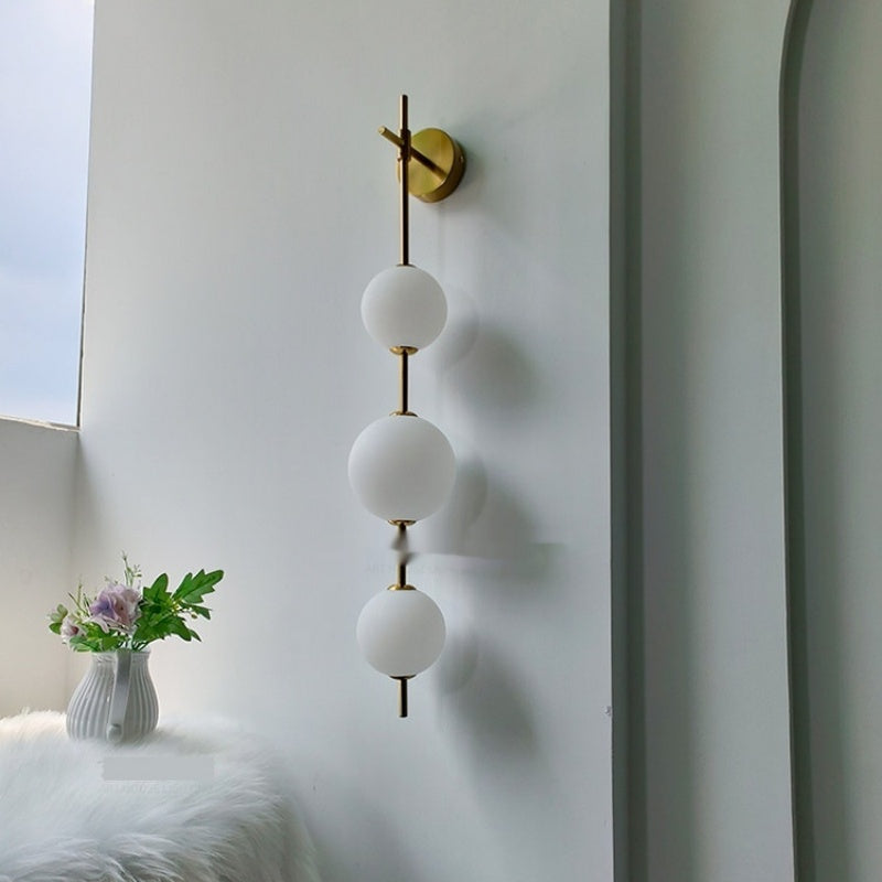 Lampe murale côté lit - Lampe perle