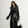 Manteau de laine avec un collier en fer forgé et long silhouette