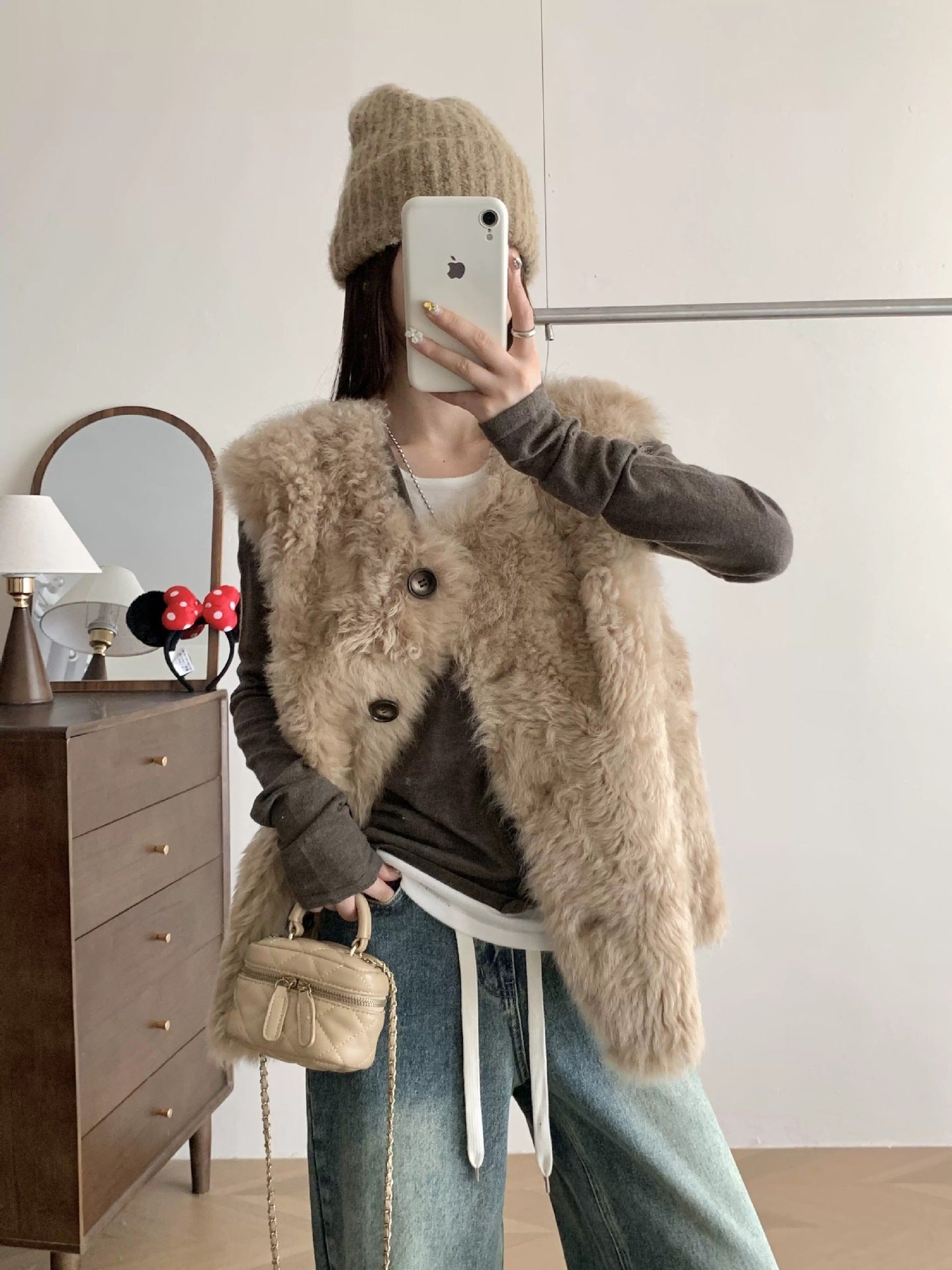 Veste en cuir et en fourrure mi-longueur