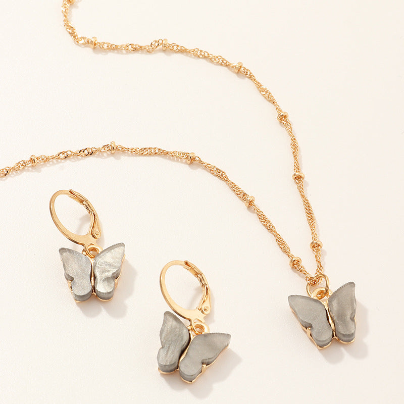 La mode créative résine papillon collier et boucle d'oreille ensemble
