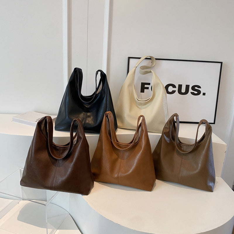 Tote coréen élégant polyvalent et occasionnel avec une grande capacitéparfait comme un sac sous-arm