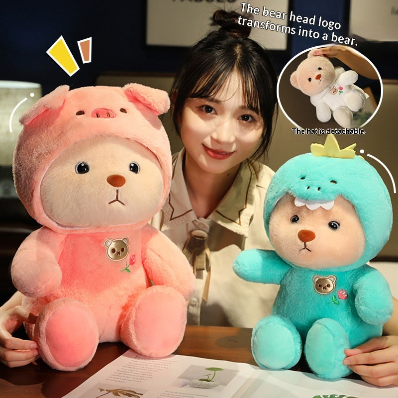 Logo de tête d'ours mignon se transforme en une poupée en peluche douce et adorable de la série Ours