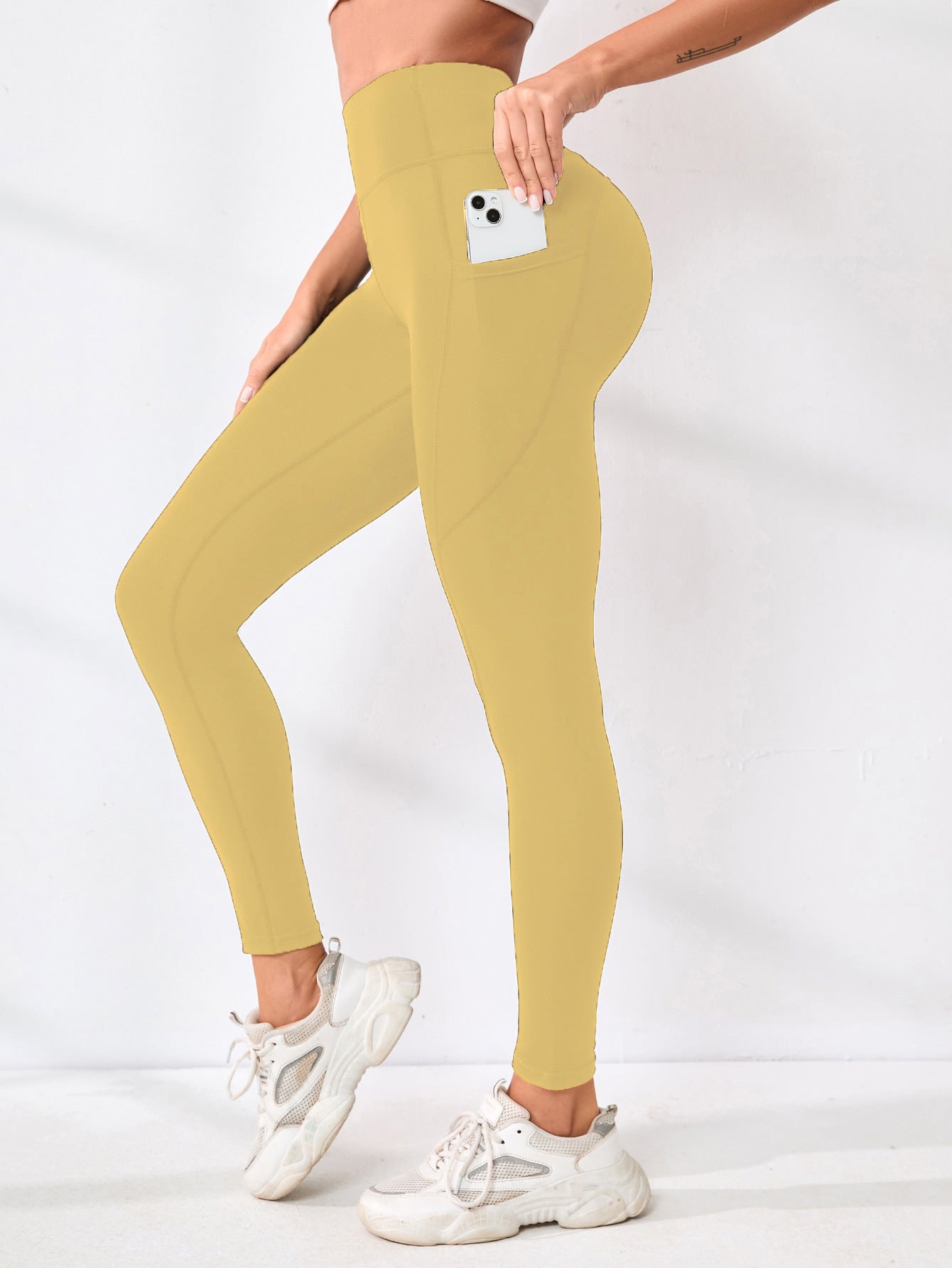 Pantalon de yoga européen et américain Couleur solide Splicing Hip-Lifting Pocket Outd