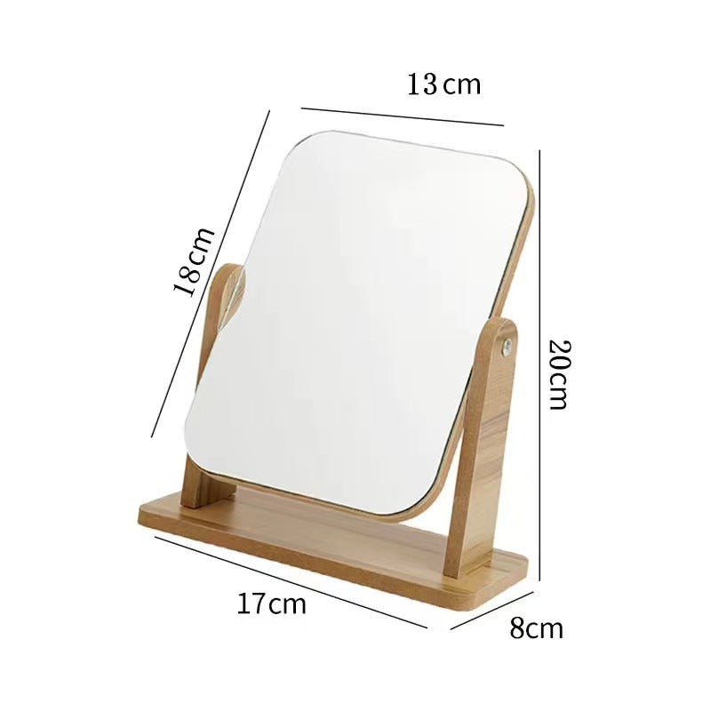 Vieux miroir de maquillage rotatif en bois