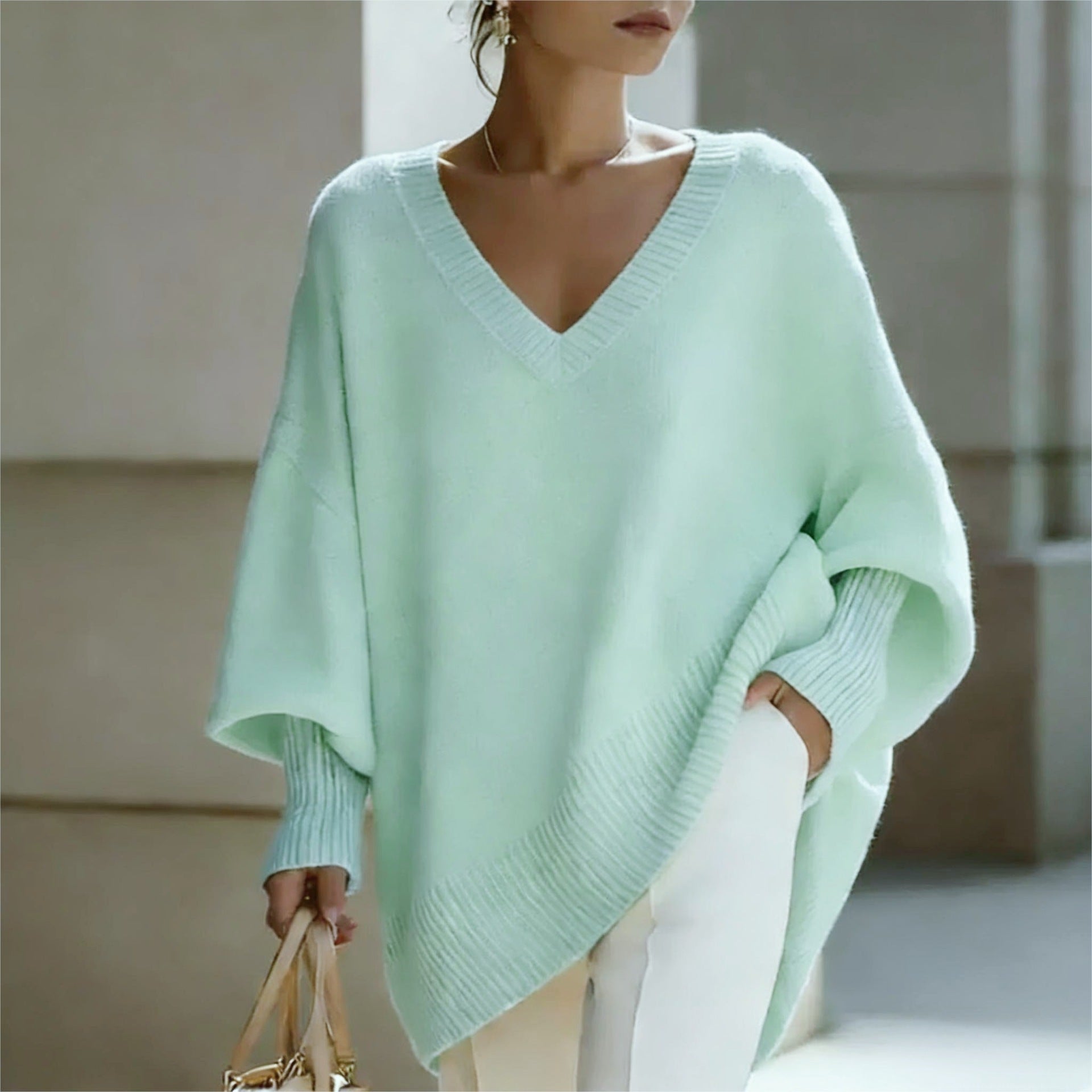 Femmes Solide-colore à la mode pull-fitting avec manches de puff et un col en V