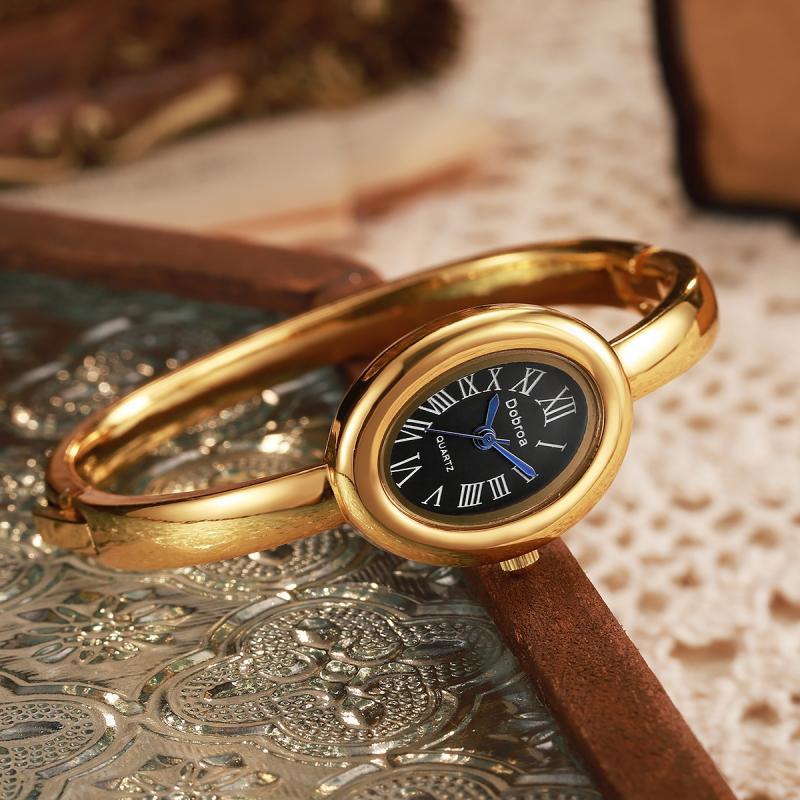 Montre femme ovale Niche légère-luxe avec une lunette diamant or rose