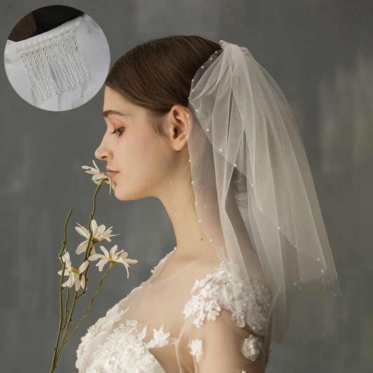 Rétro femme mariée courte coiffure mariée