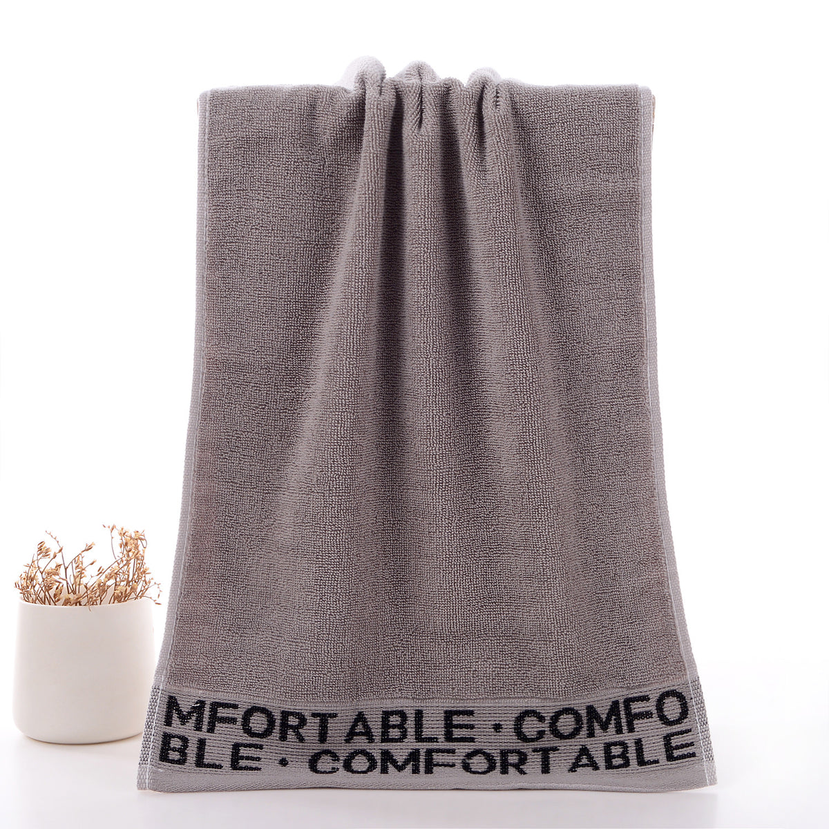 Serviette de coton et lavage du visage
