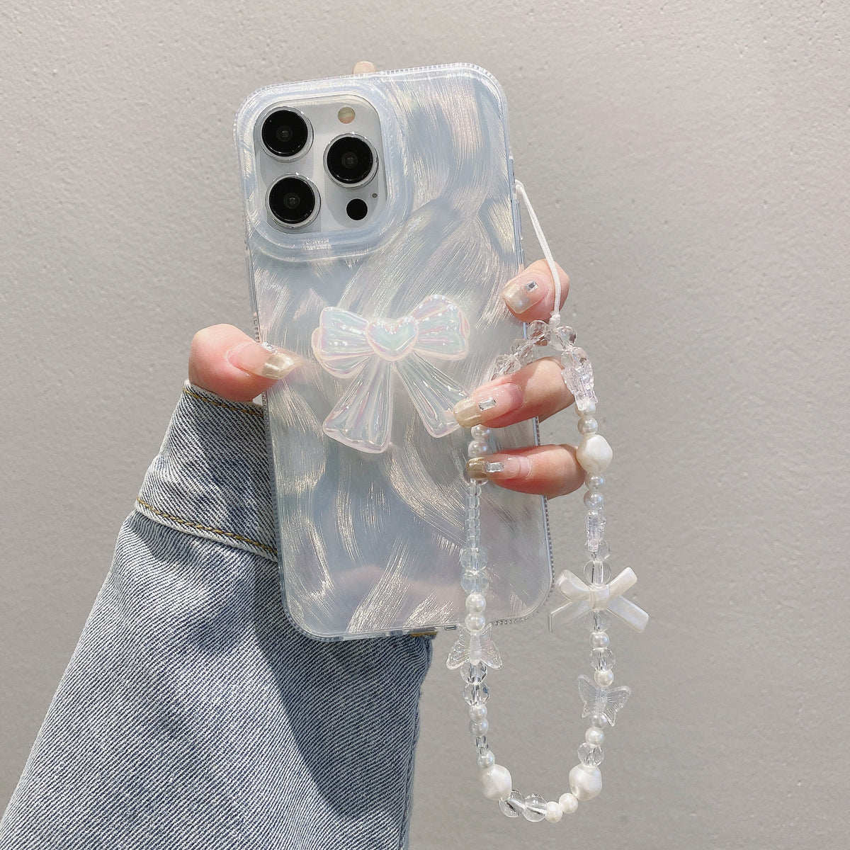 Cas de téléphone à chaîne en fils de plumes de luxe Bow