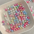 Perles en soie perles acryliques en forme de perles avec trou droit