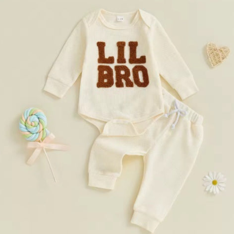 Costume de bébé en tricot de gaufre européen et américain bleu