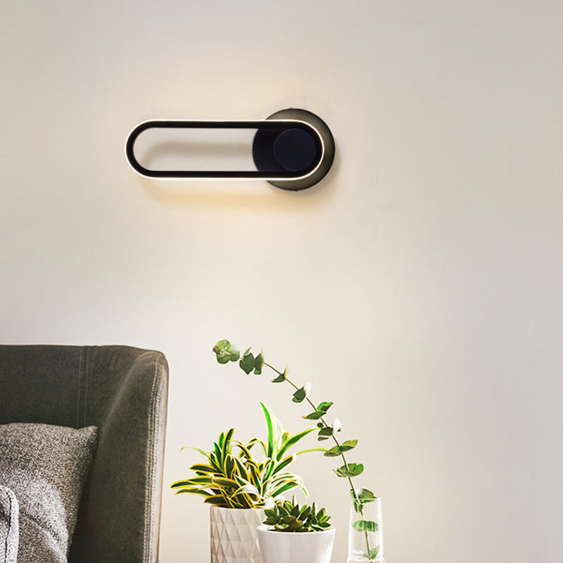 Rotating bedside wall lamp