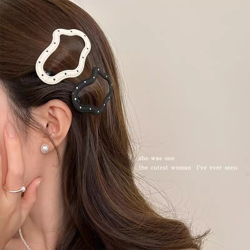 Black and white five-point star leather clip