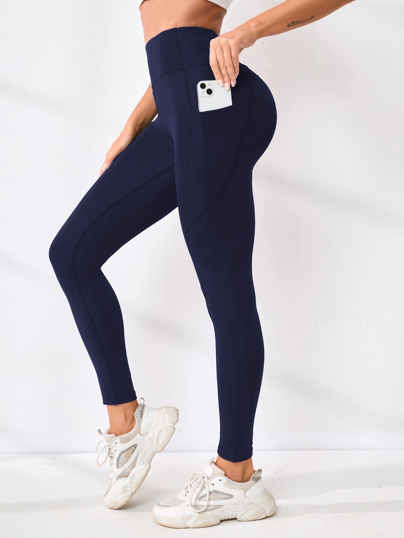 Pantalon de yoga européen et américain Couleur solide Splicing Hip-Lifting Pocket Outd