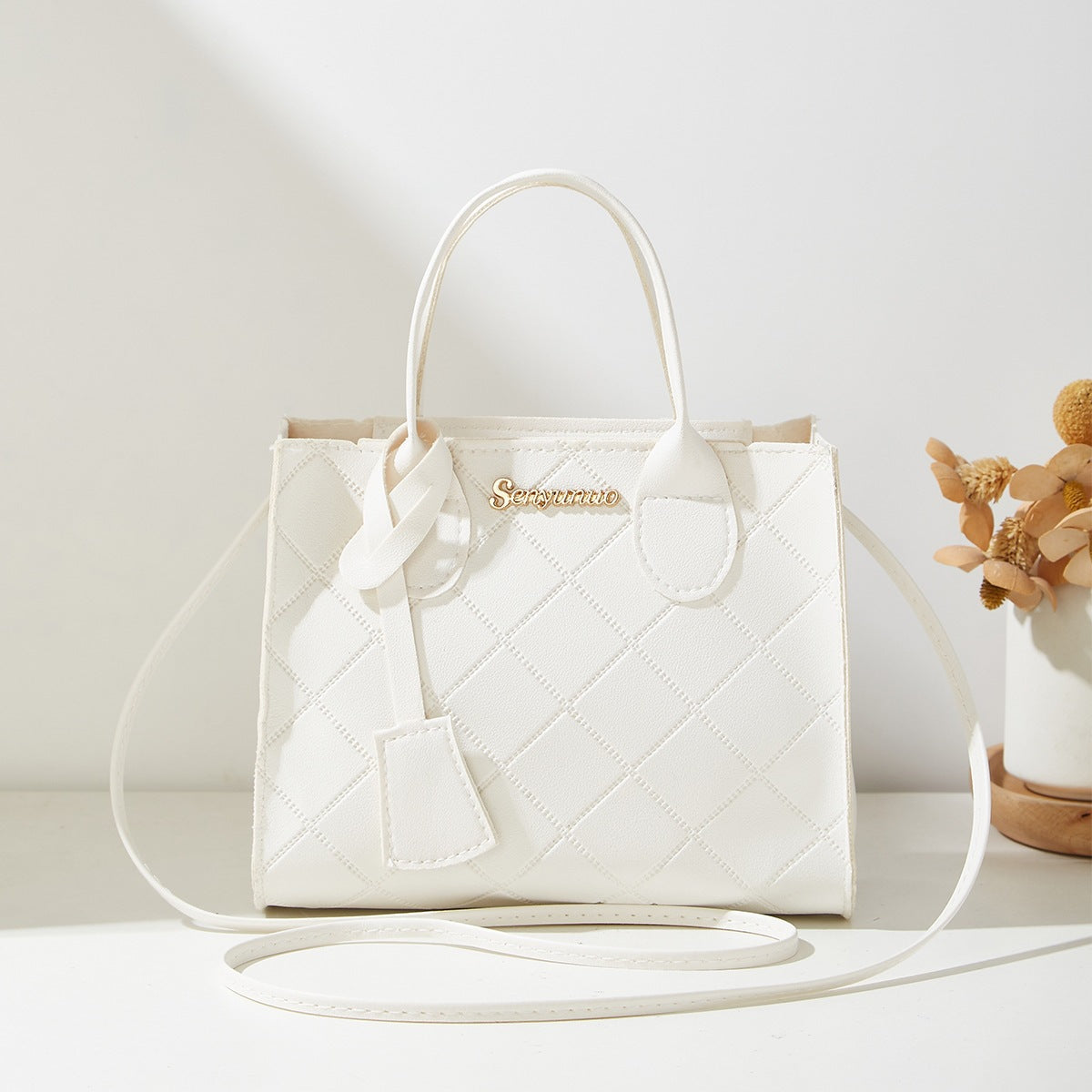 Sac à bandoulière unique matelassé en diamant