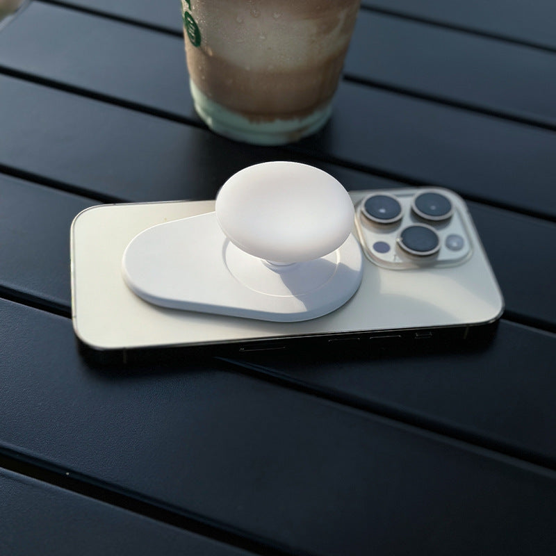 Couvercle de coupe en silicone applicable au support de coussin gonflable de téléphone mobile magnétique