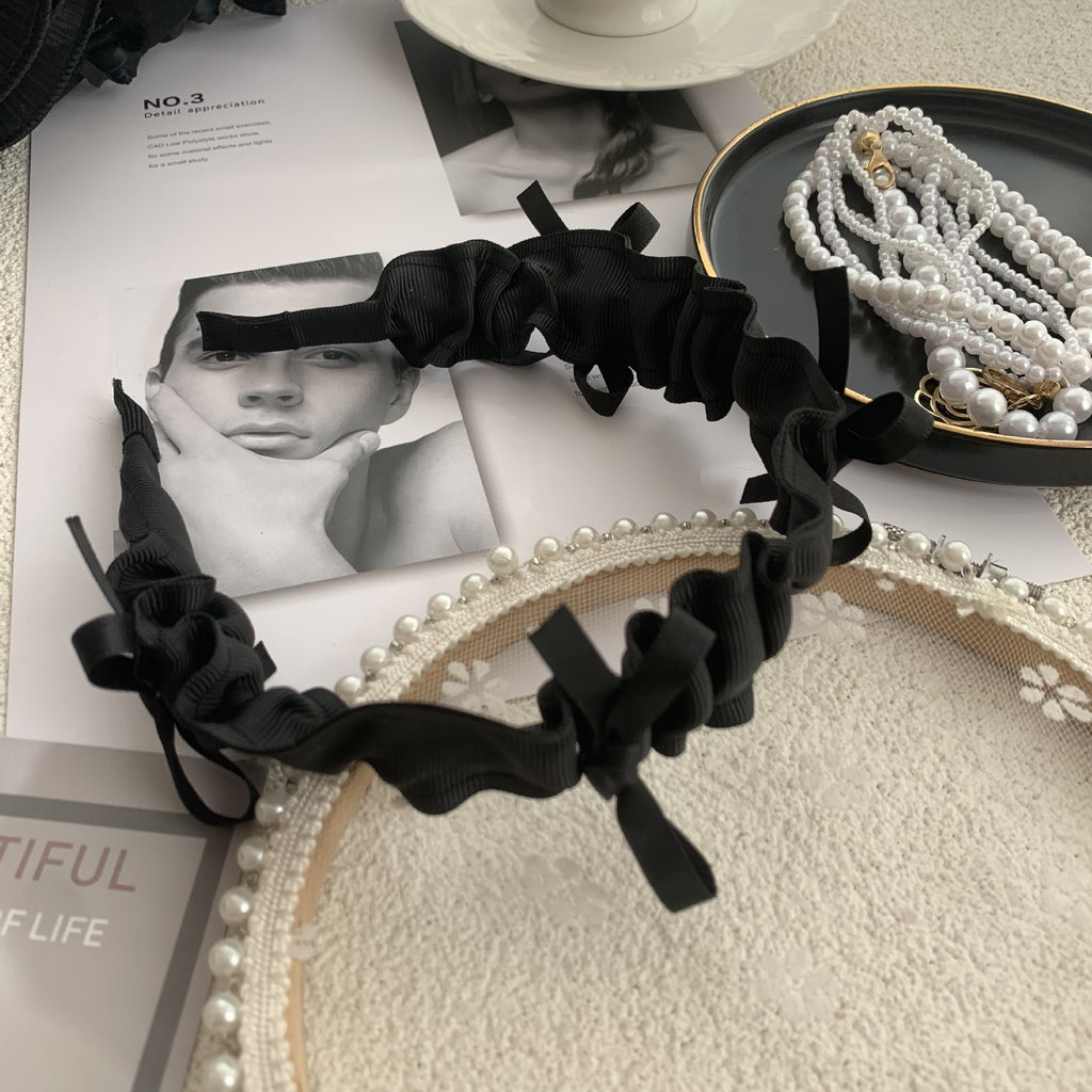 Exaggerated Black Wood Ear Hoop Hairstyle