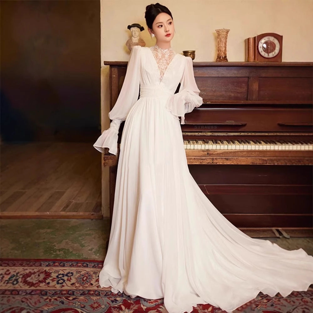 Robe de mariée vintage en dentelle de style français avec manches de puff