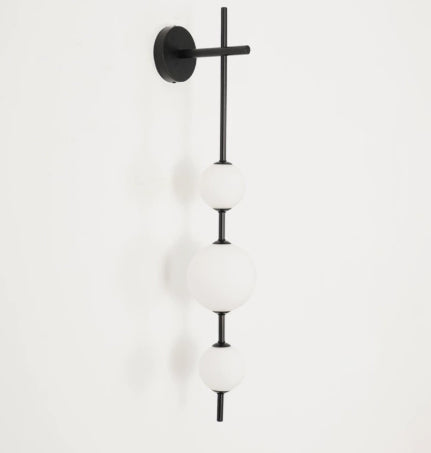 Lampe murale côté lit - Lampe perle