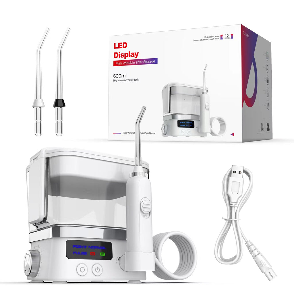 Irrigateur oral portatif à usage domestique