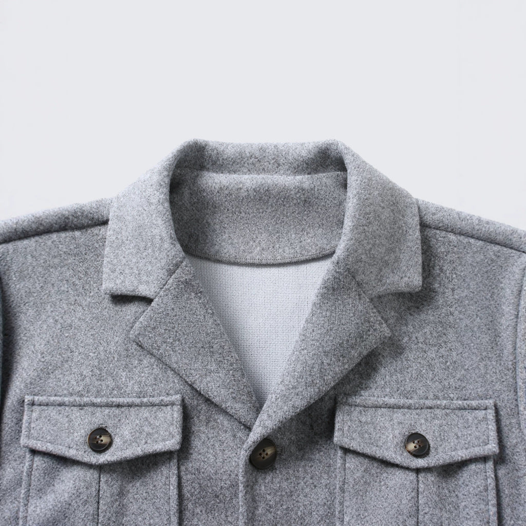 Manteau à manches simples pour hommes Lapel avec plusieurs poches