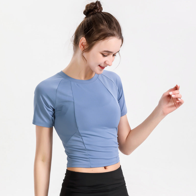 L'usure du yoga mince à manches courtes pour femmes