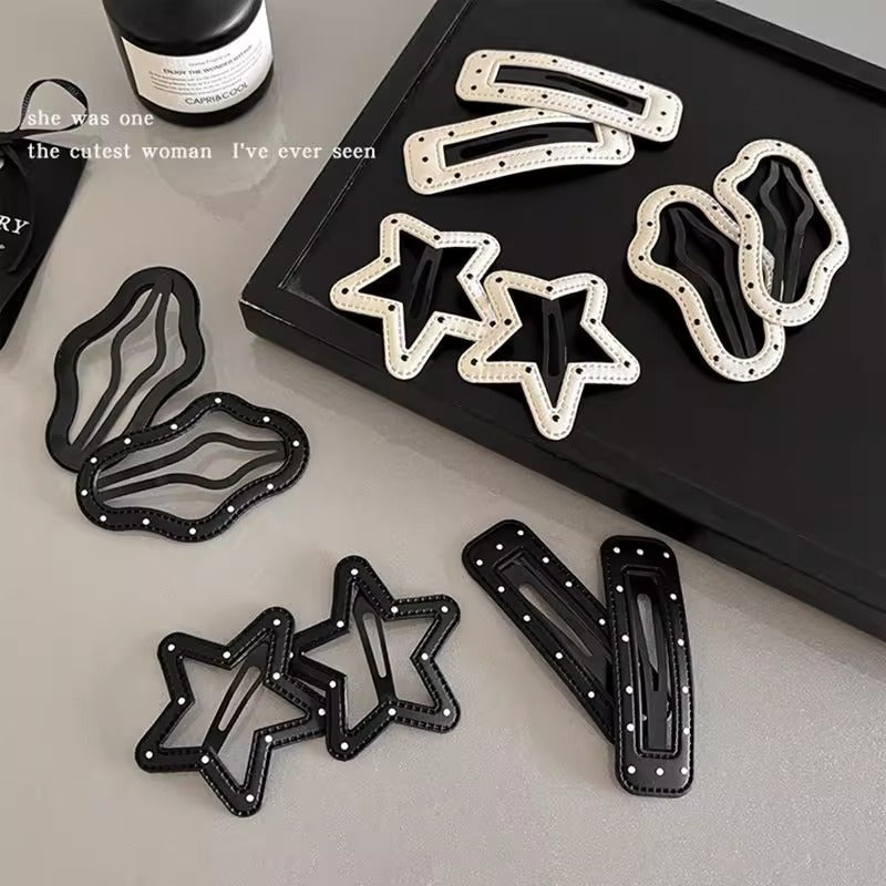 Black and white five-point star leather clip
