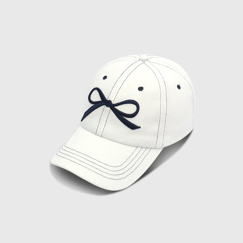 Le cap de baseball souple de la Dame est adapté pour O