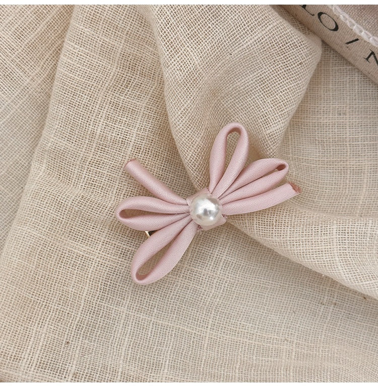 Clip latéral Bangs Pearl Bow Une paire de clips de canard