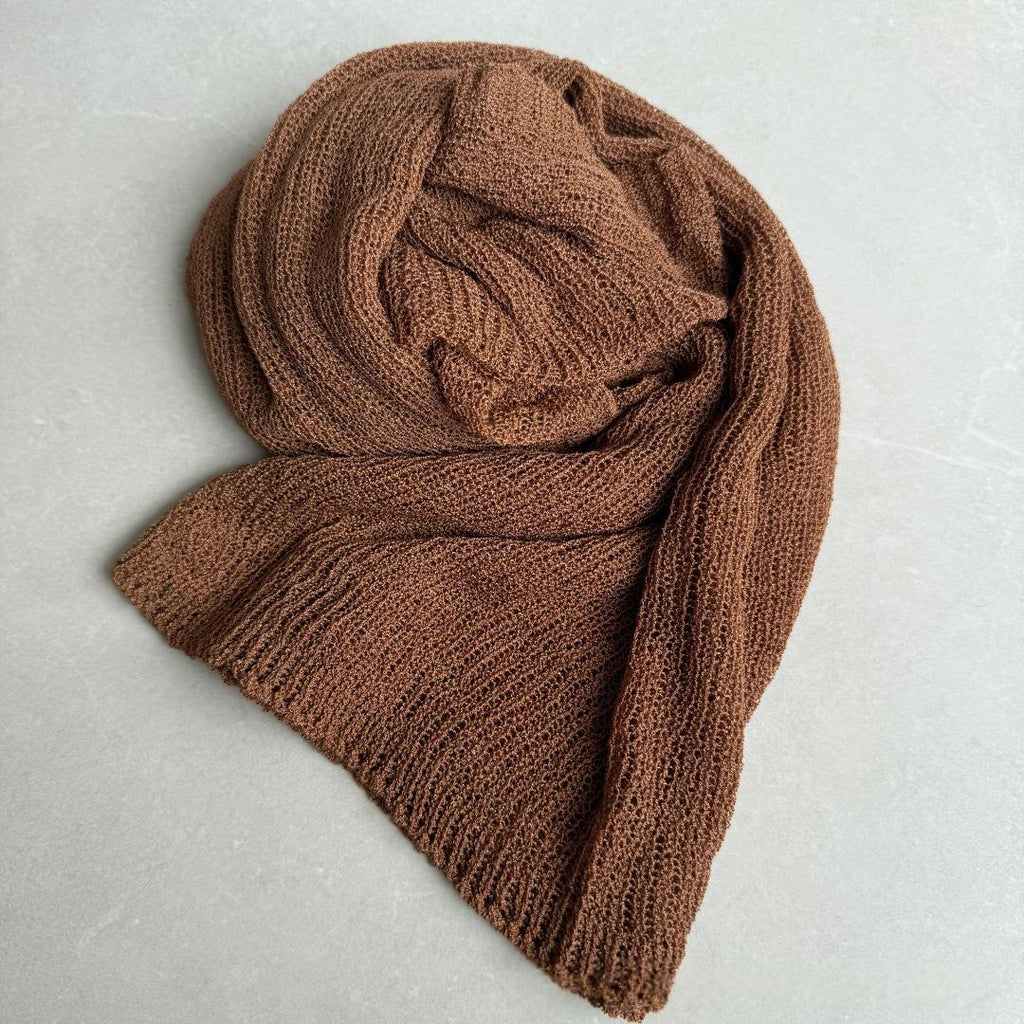 Cape à mailles creuses et protectrices du soleil