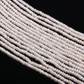 Perles rondes plates d'eau douce naturelles exquises