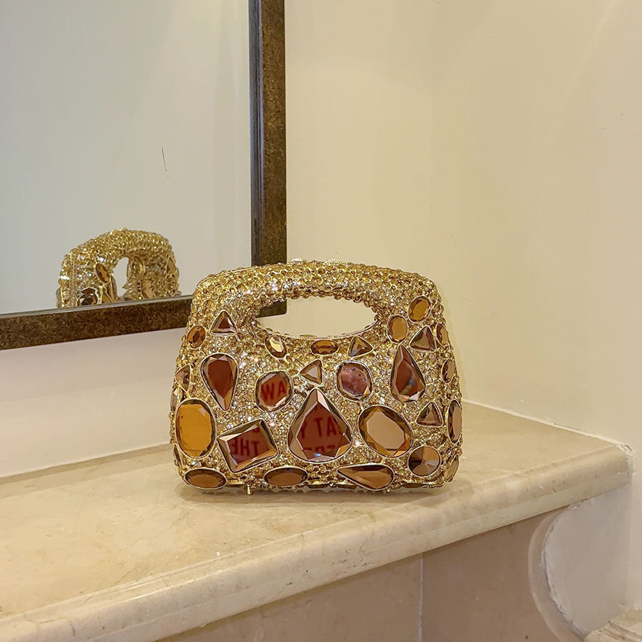 Sac à main de soirée doré robuste avec diamants